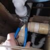 Channellock 9" Oil Filter/PVC Plier 209 — In Use under Sink View Channellock 9" Oil Filter/PVC Plier 209 — oil filter PVC pipe gripping