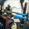 Channellock 9.5" Tongue & Groove Pliers, Straight Jaw 420 — In Use Top View Channellock 9.5" Tongue & Groove Pliers, Straight Jaw 420 — gripping pipe fittings plumbing repairs