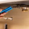 Channellock 2012 12-inch Oil Filter/PVC Angled Head Pliers — used to install a sink drain retainer