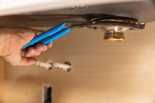 Channellock 2012 12-inch Oil Filter/PVC Angled Head Pliers — used to install a sink drain retainer